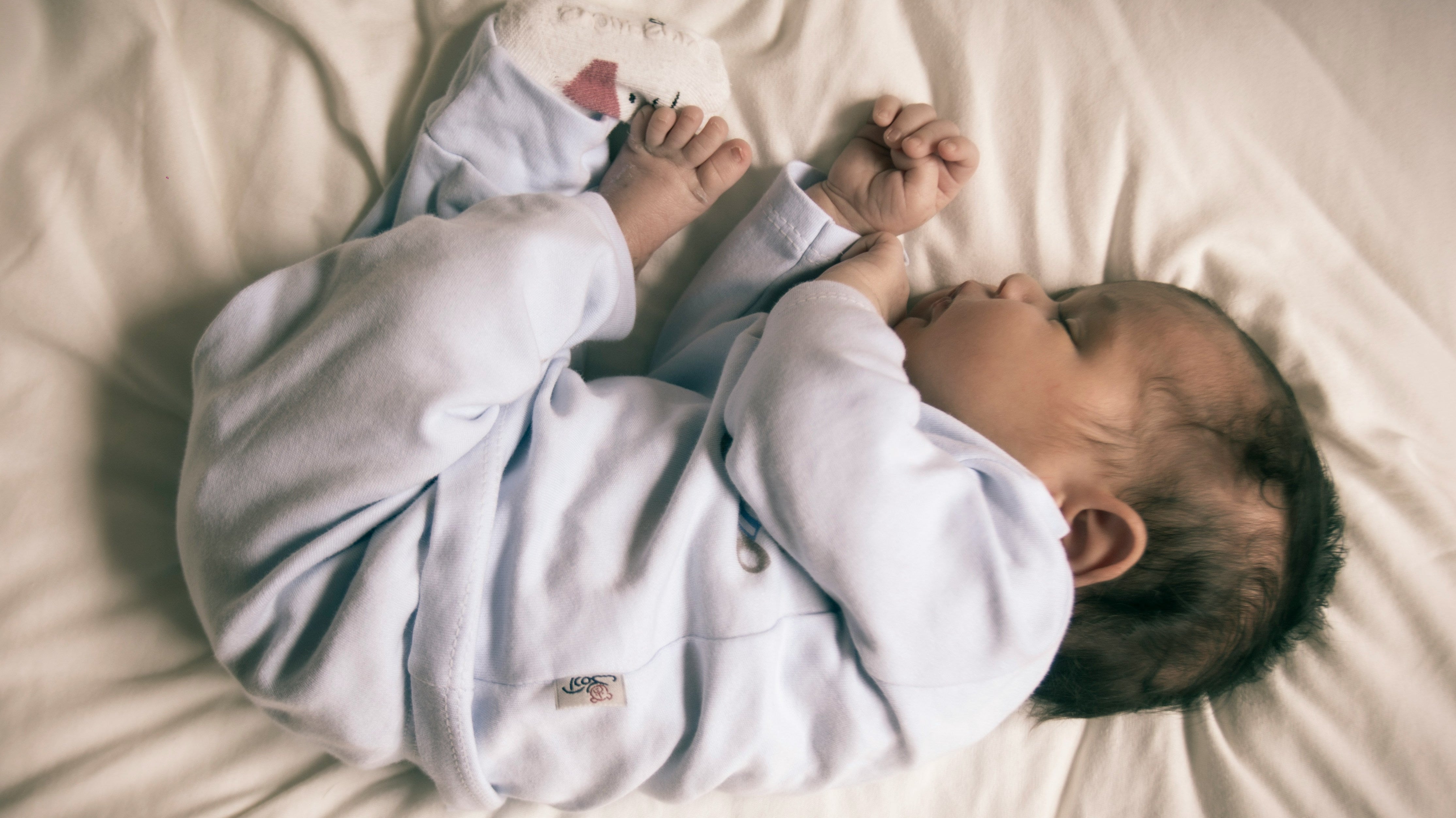 newborn fighting sleep