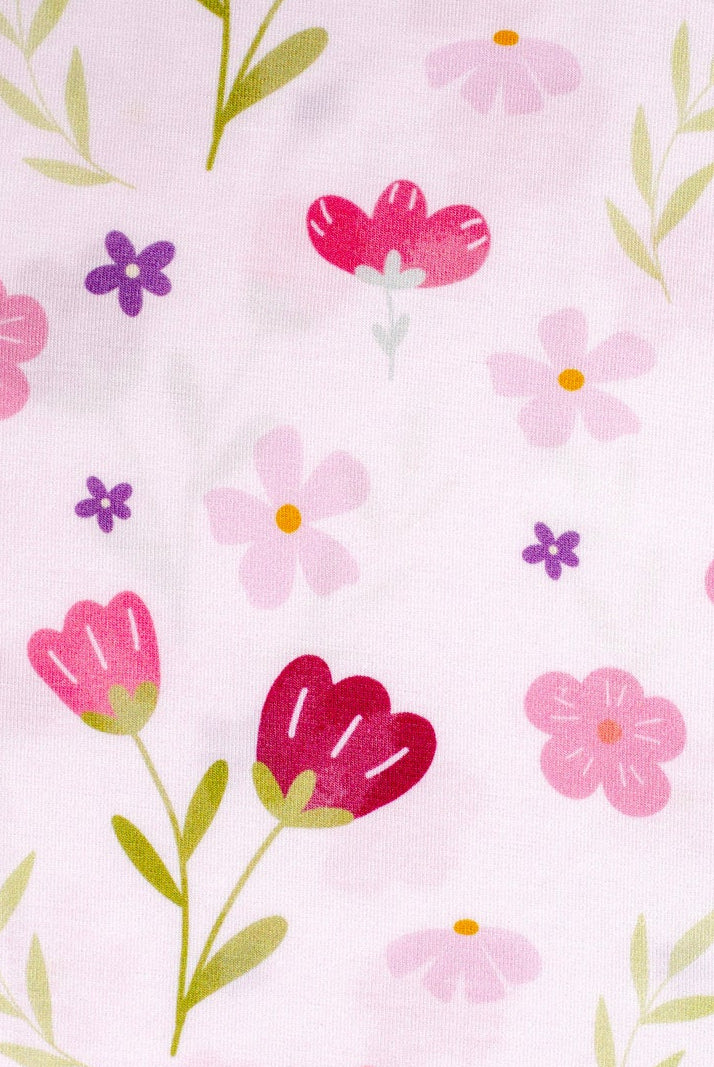 Charming pink flower-print bamboo pajamas for girls, designed for comfort and style.