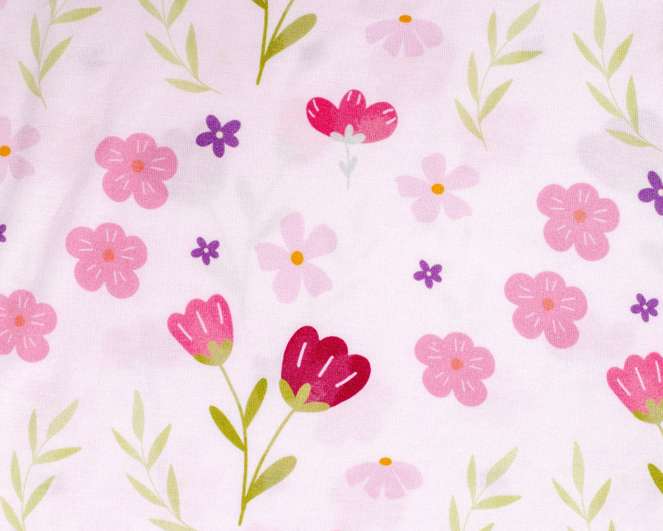 Charming pink flower-print bamboo pajamas for girls, designed for comfort and style.