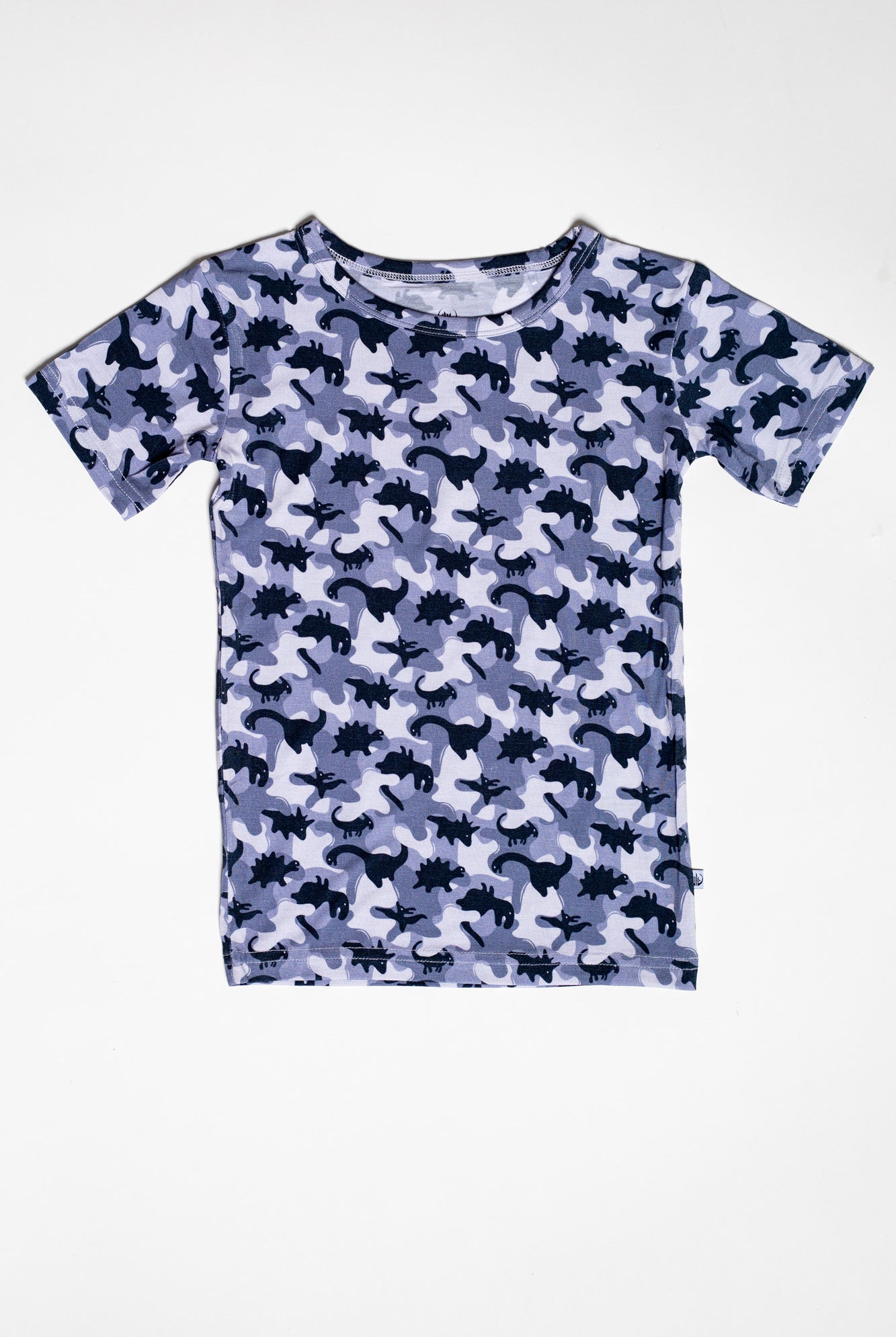 Cozy and hypoallergenic Earthly Threads bamboo short sleeve pajama set for kids designed with a camo-inspired dinosaur print.