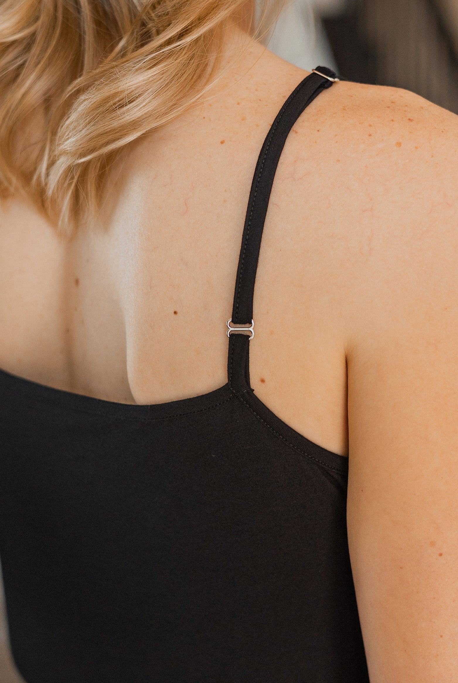 Relaxed-fit tan bamboo pajama set featuring an elegant slip top and stylish flared pants. Designed with bamboo fabric with hypoallergic and antibacterial properties.