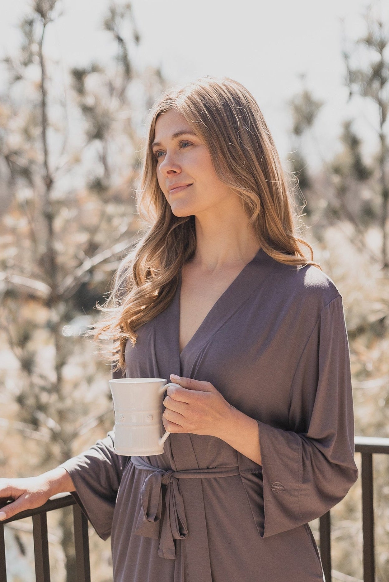 Soft and breathable bamboo long sleeve robe with a relaxed fit and adjustable tie waist for personalized comfort.