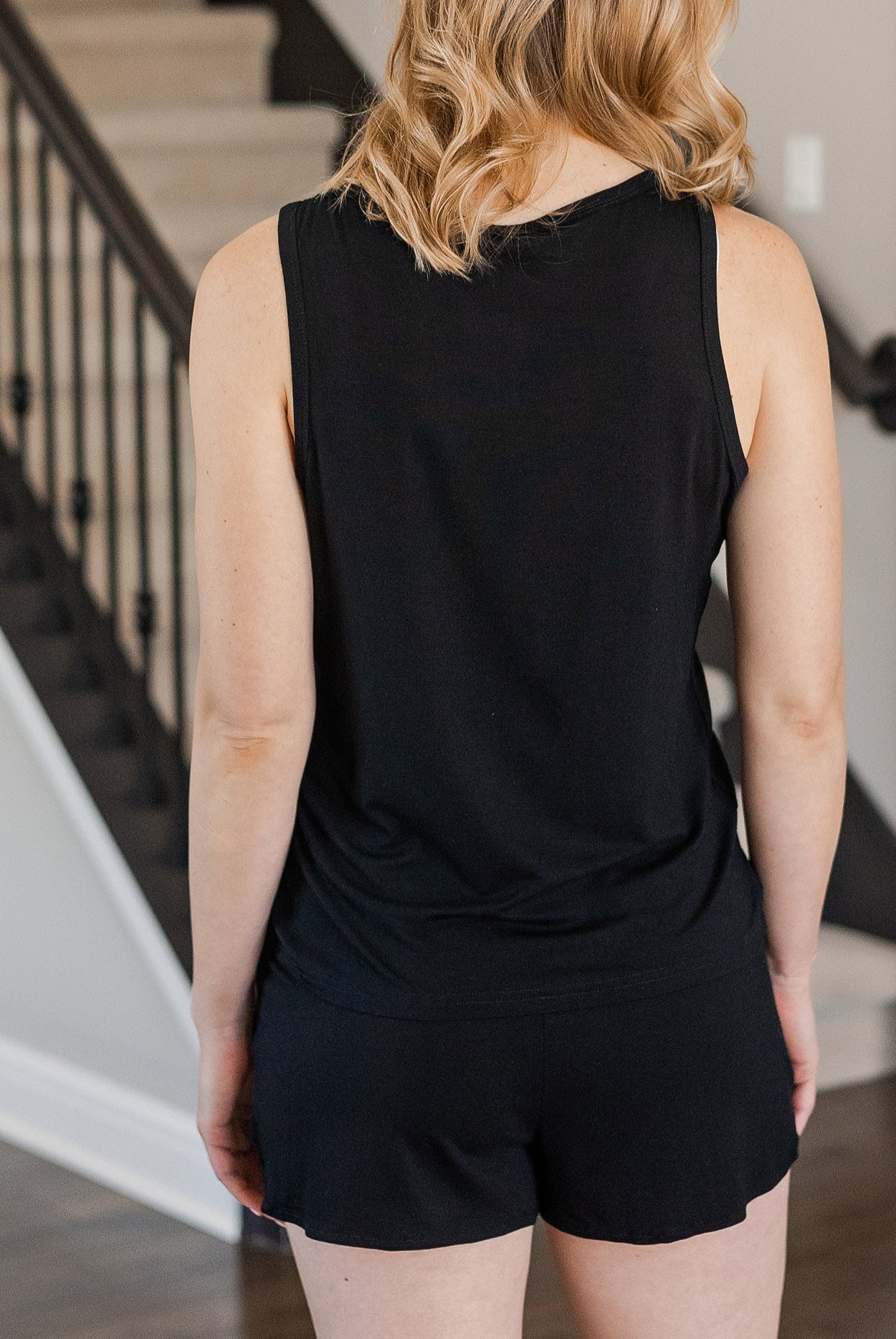 Relaxed-fit tank and jogger short set, designed for movement, breathability, and an easygoing feel.