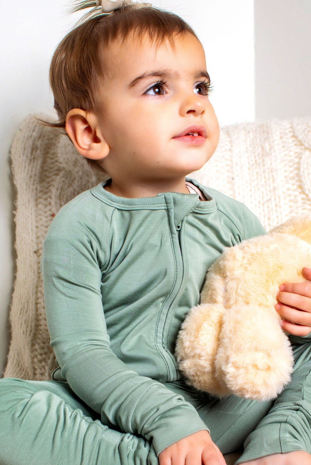 Earthly Threads organic bamboo baby zip sleeper in neutral tones with dual zippers for easy changes.