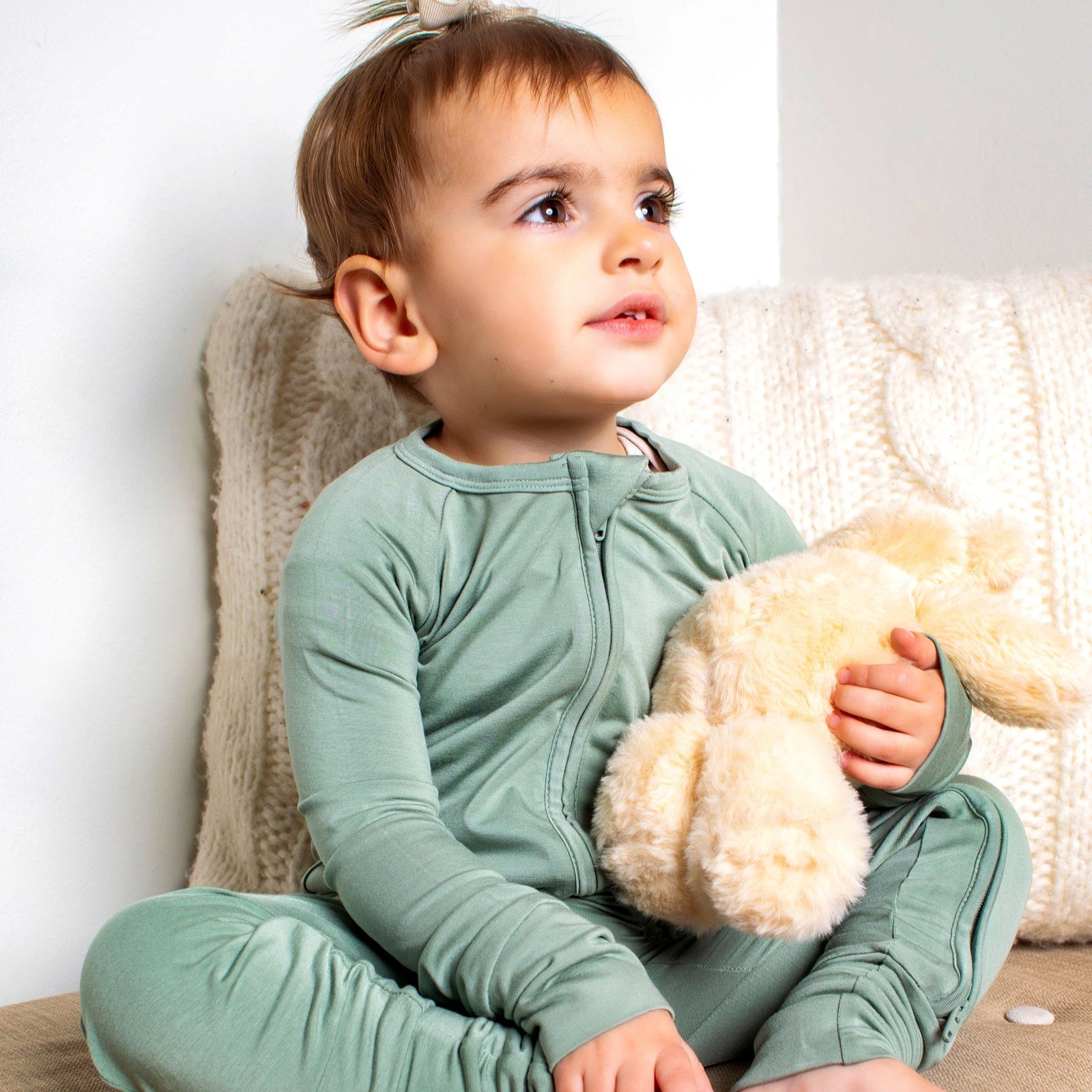 Earthly Threads organic bamboo baby zip sleeper in neutral tones with dual zippers for easy changes.