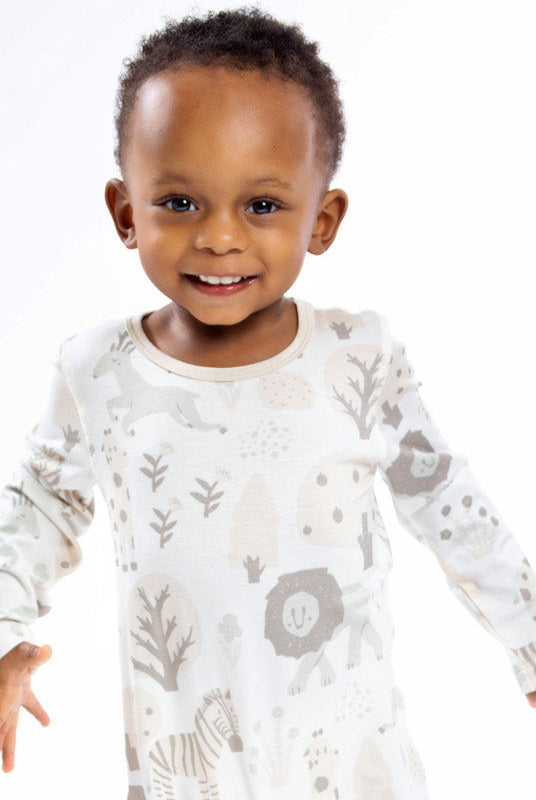 Earthly Threads safari-themed long sleeve bamboo romper with zebras, lions, and giraffes for little explorers.