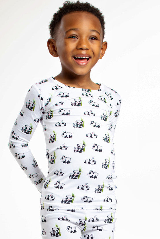 Ultra-soft kids’ bamboo pajamas featuring an adorable, snuggly panda pattern for cozy nights.