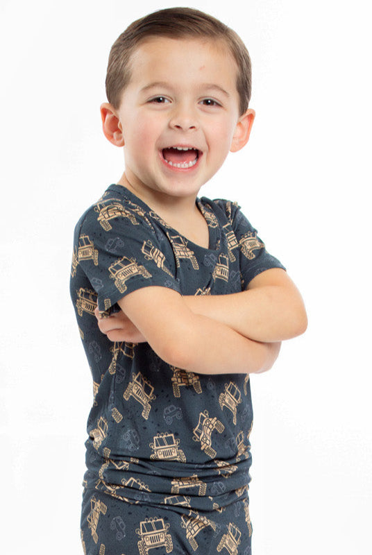 Earthly Threads off-road truck bamboo pajamas for kids, perfect for adventure lovers.