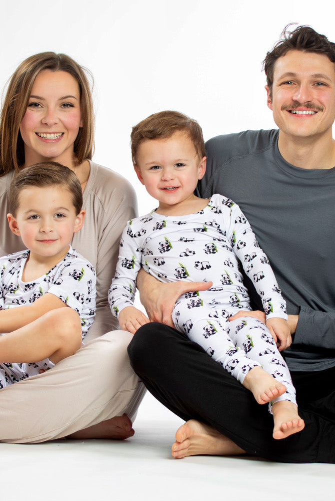 Hypoallergenic and antibacterial bamboo pajamas with pandas and bamboo print, perfect for kids with sensitive skin.