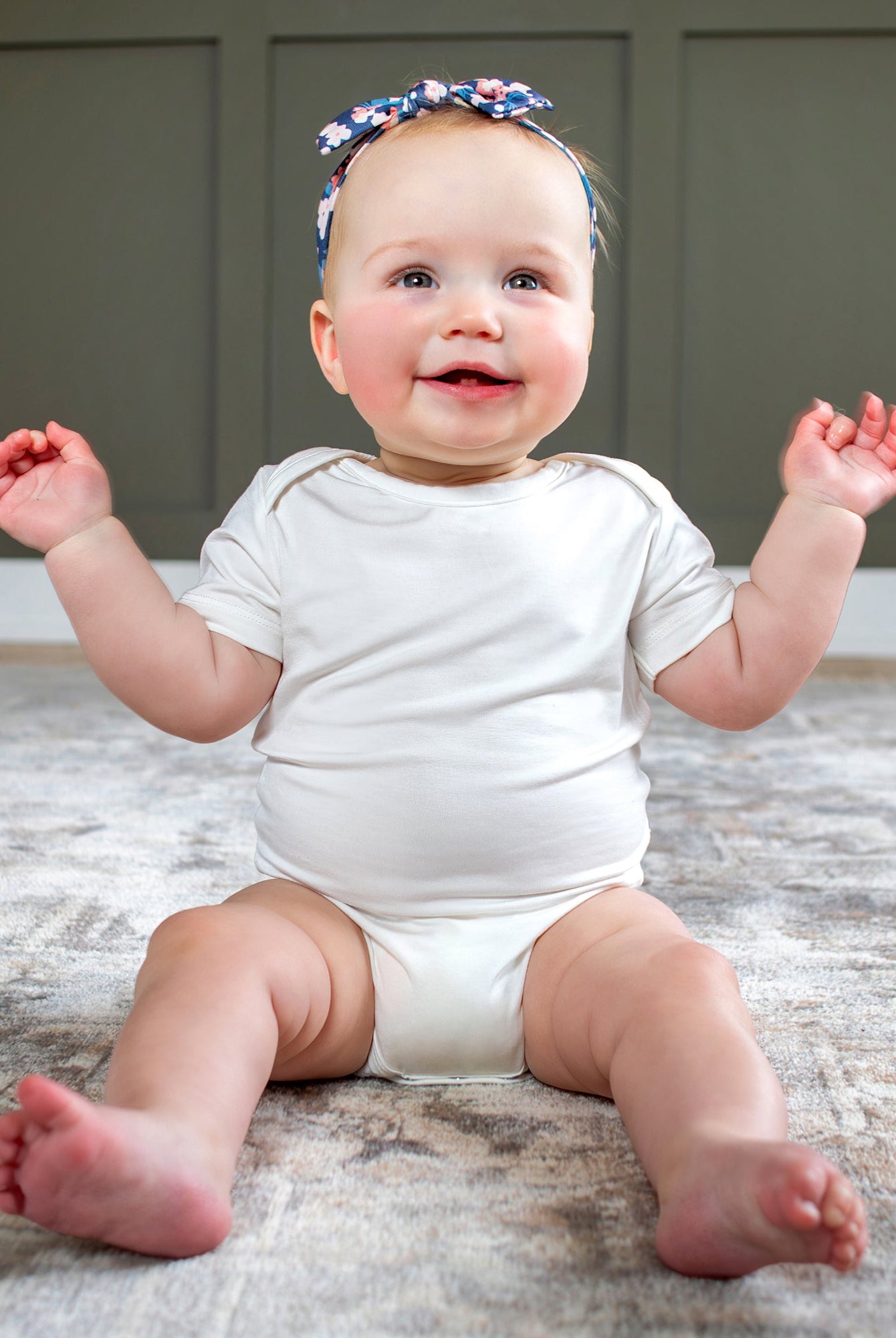 Earthly Threads bamboo baby short sleeved bodysuit or onesie is an essential for hot summer nights or layering for comfort, available in an array of neutral colors.