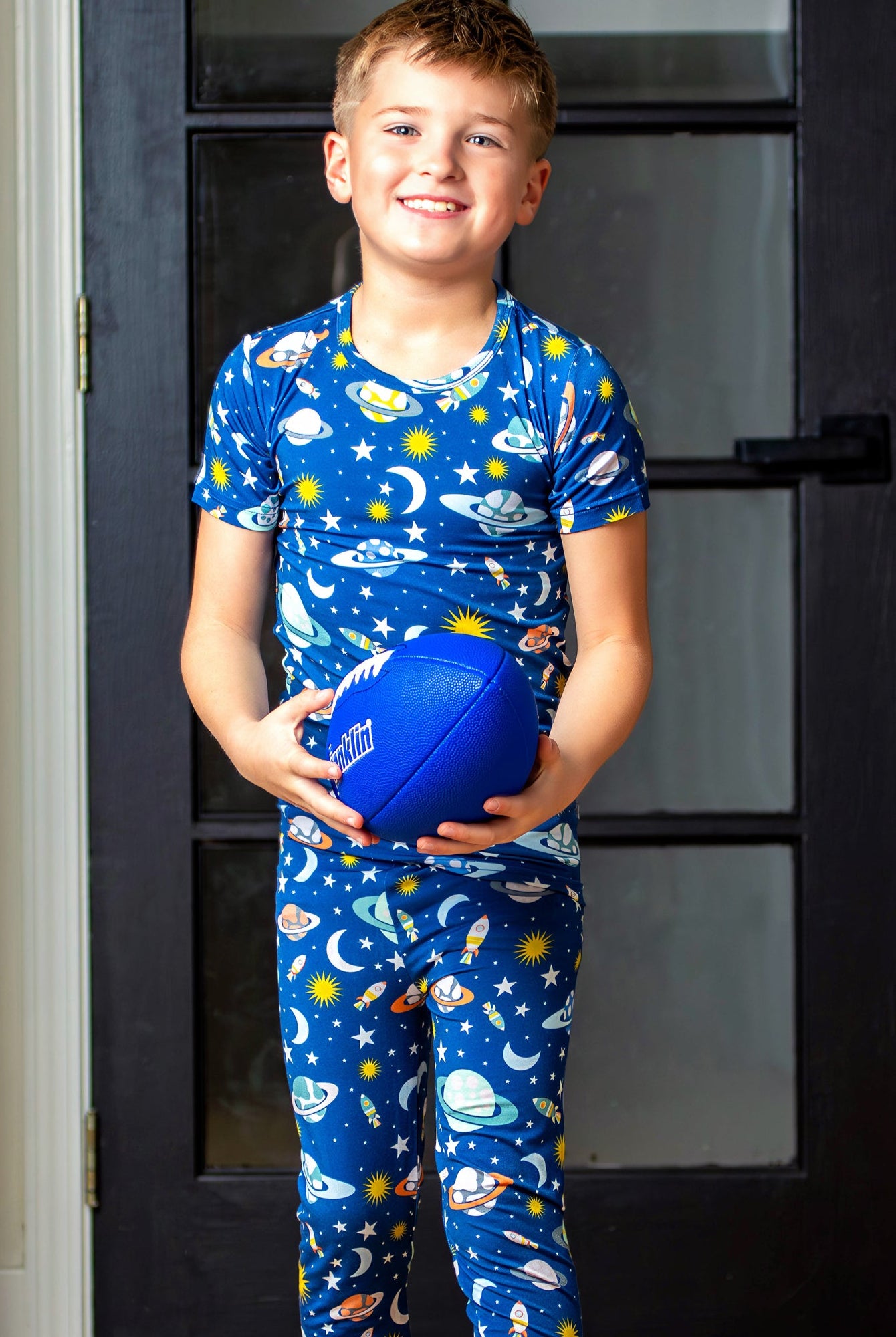Planets and stars bamboo pajamas for your little sleepy explorers from Earthly Threads.