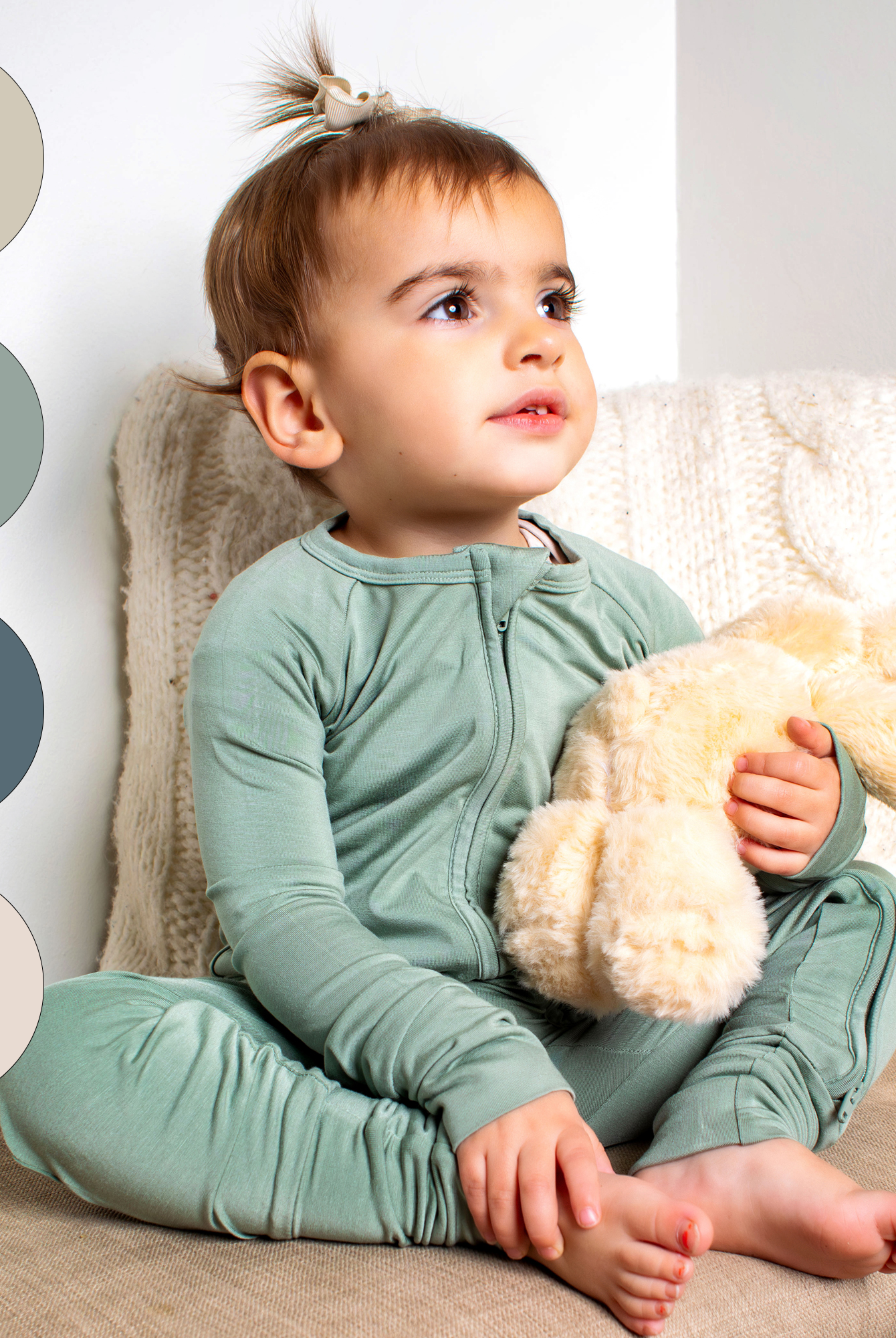 Earthly Threads bamboo Versatile Zip bamboo baby sleep romper in an array of neutral colors is super soft, hypoallergenic, and moisture wicking.