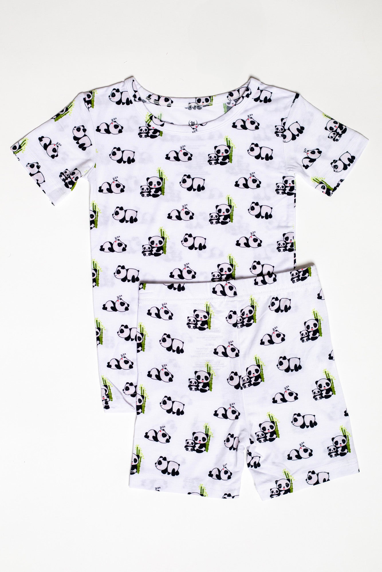 Buttery soft and incredibly gentle two-piece short sleeve pajama set in panda print for kids.