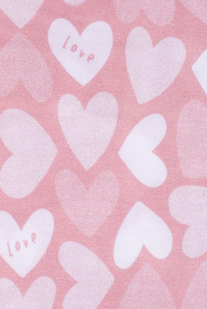 Earthly Threads soft bamboo pajamas with pink and white hearts for kids.