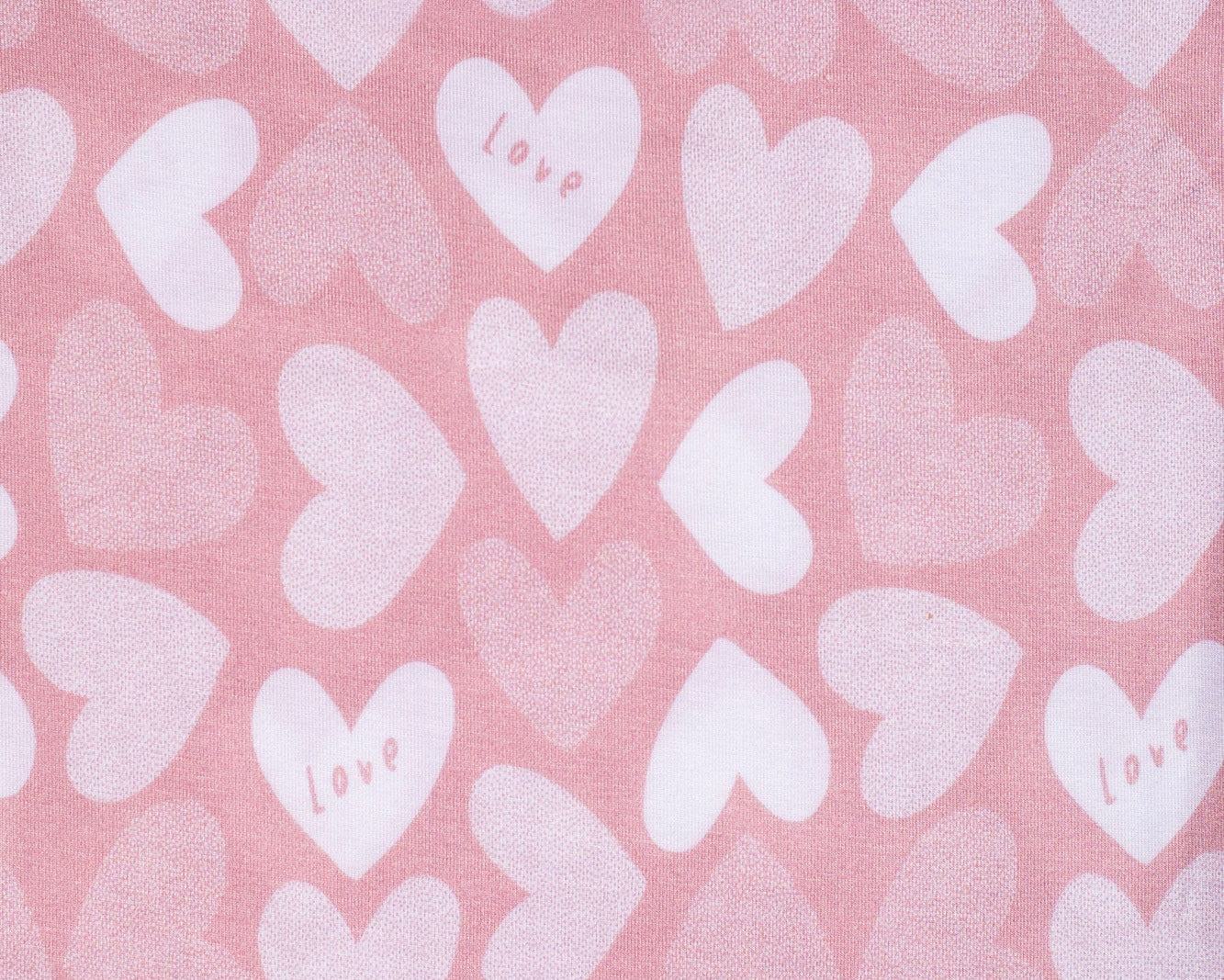 Earthly Threads soft bamboo pajamas with pink and white hearts for kids.
