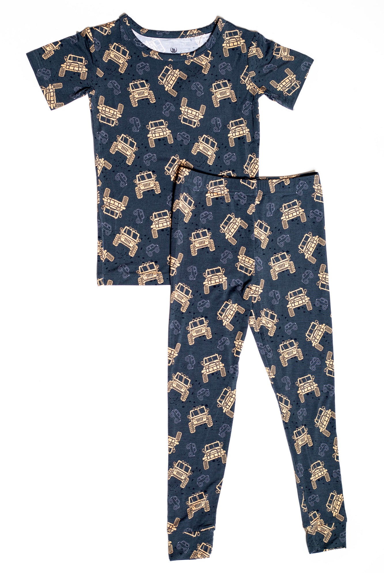 Two-piece short sleeve pajama set with rugged trucks for little explorers.