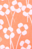 Cozy floral bamboo pajamas with a vibrant orange blossom print, made for ultimate softness and all-season breathability.