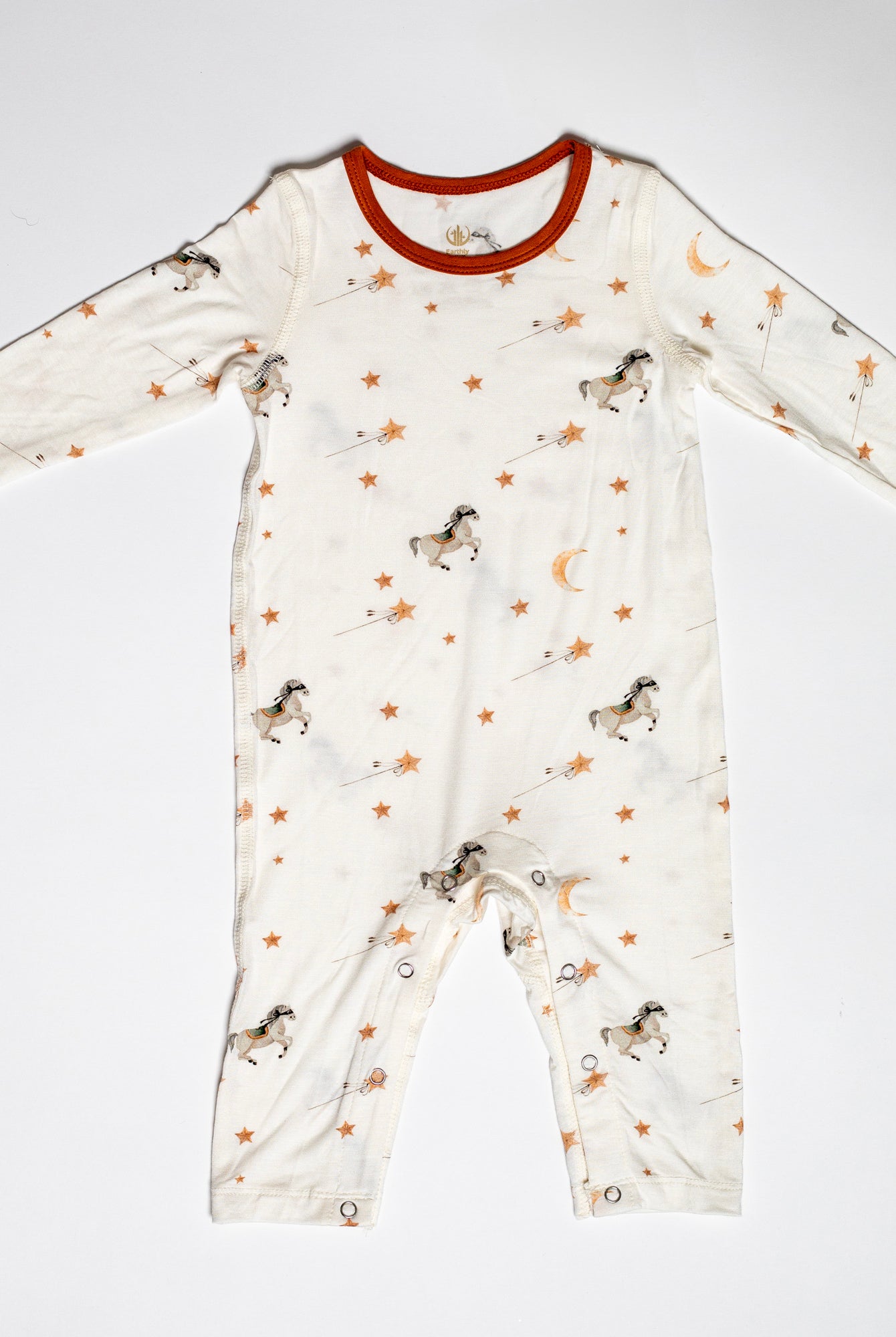 Cozy Pony Up bamboo snap romper with masked ponies, stars, and moons, crafted for breathable, all-night comfort.