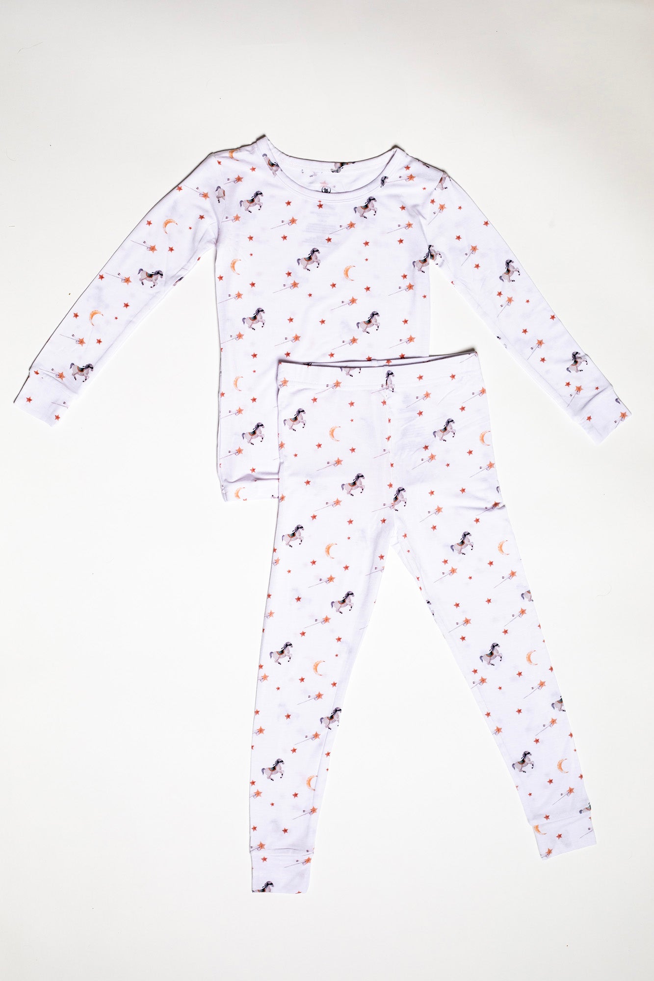 Cozy long sleeve bamboo pajama set featuring playful masked ponies, twinkling stars, and crescent moons for a magical bedtime.