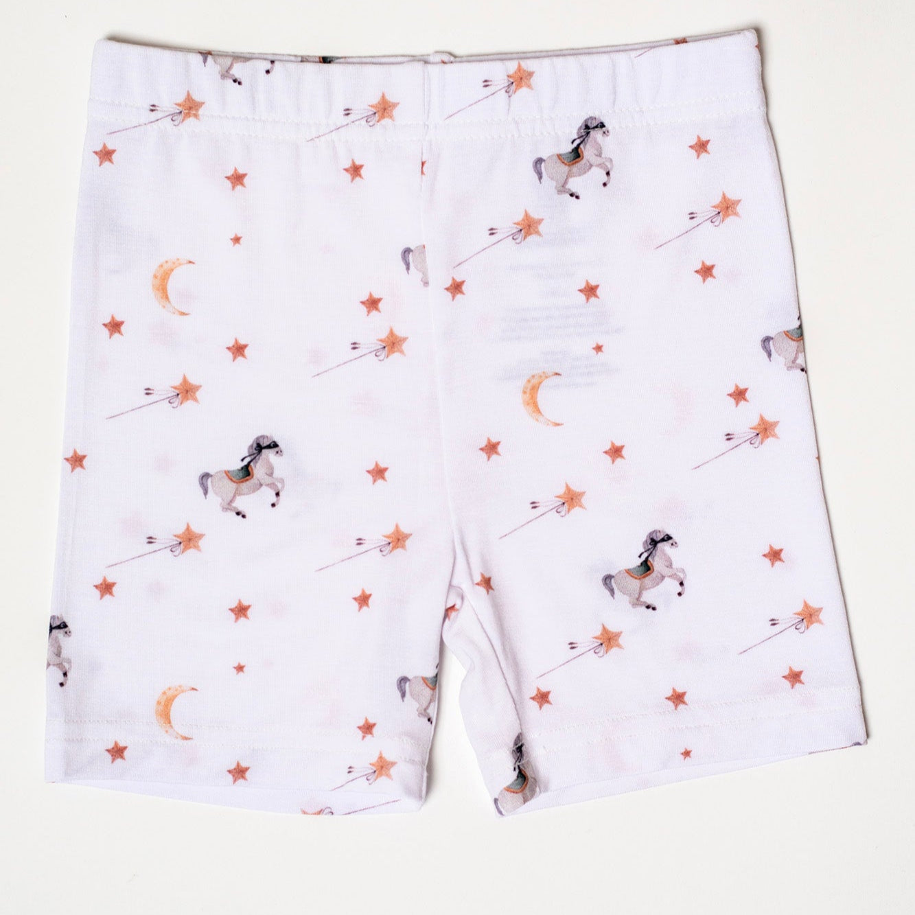 Hypoallergenic and stretchable bamboo pajama set with an enchanting pony print, available in short sleeves and shorts.