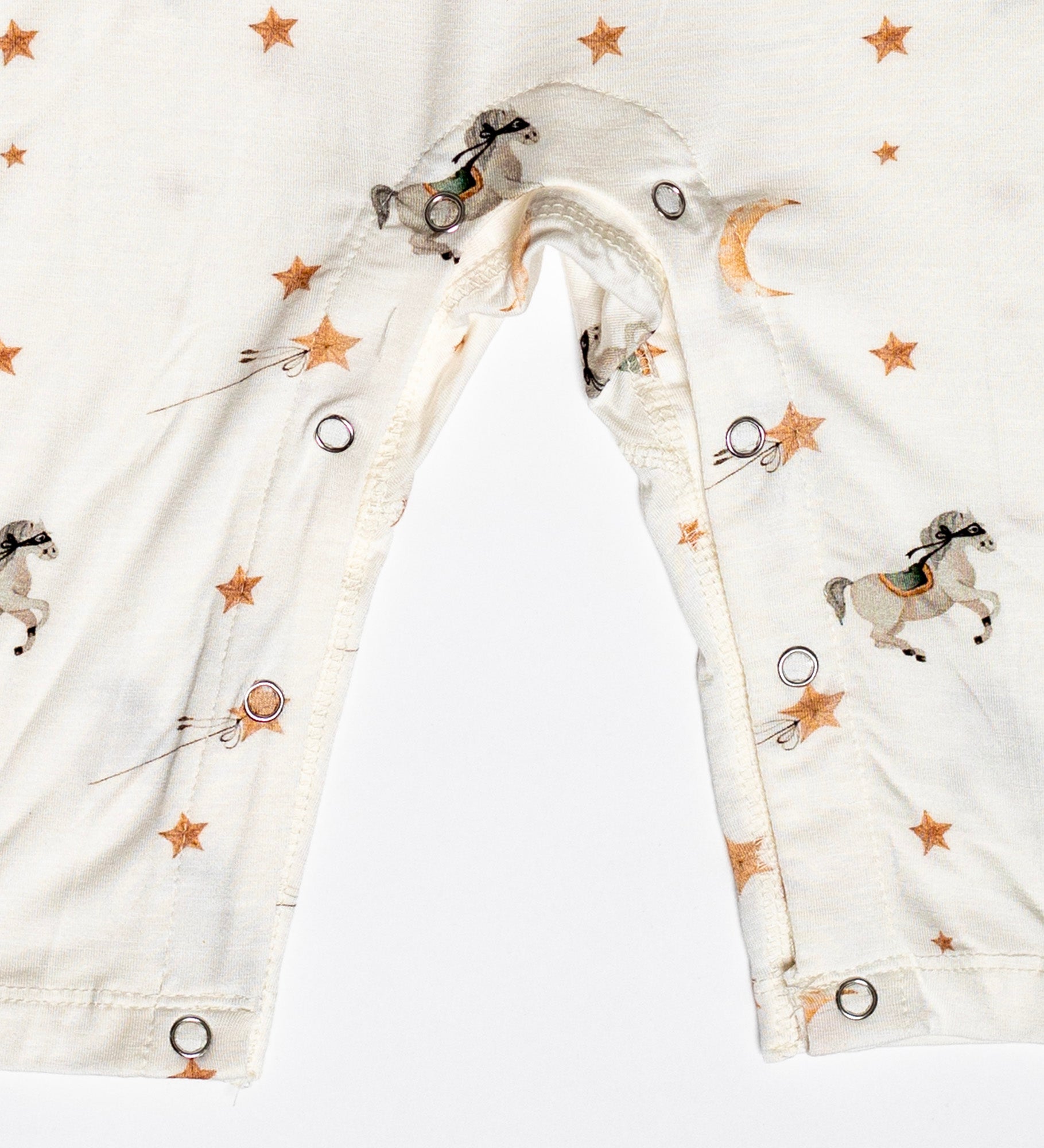 One-piece snap romper with an enchanting pony print and buttery-soft bamboo fabric.