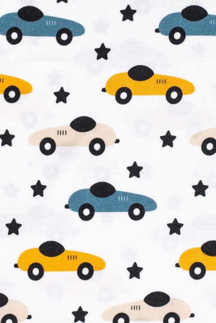 Eco-friendly bamboo pajama set with a fun race car and star pattern, designed for bedtime adventures.