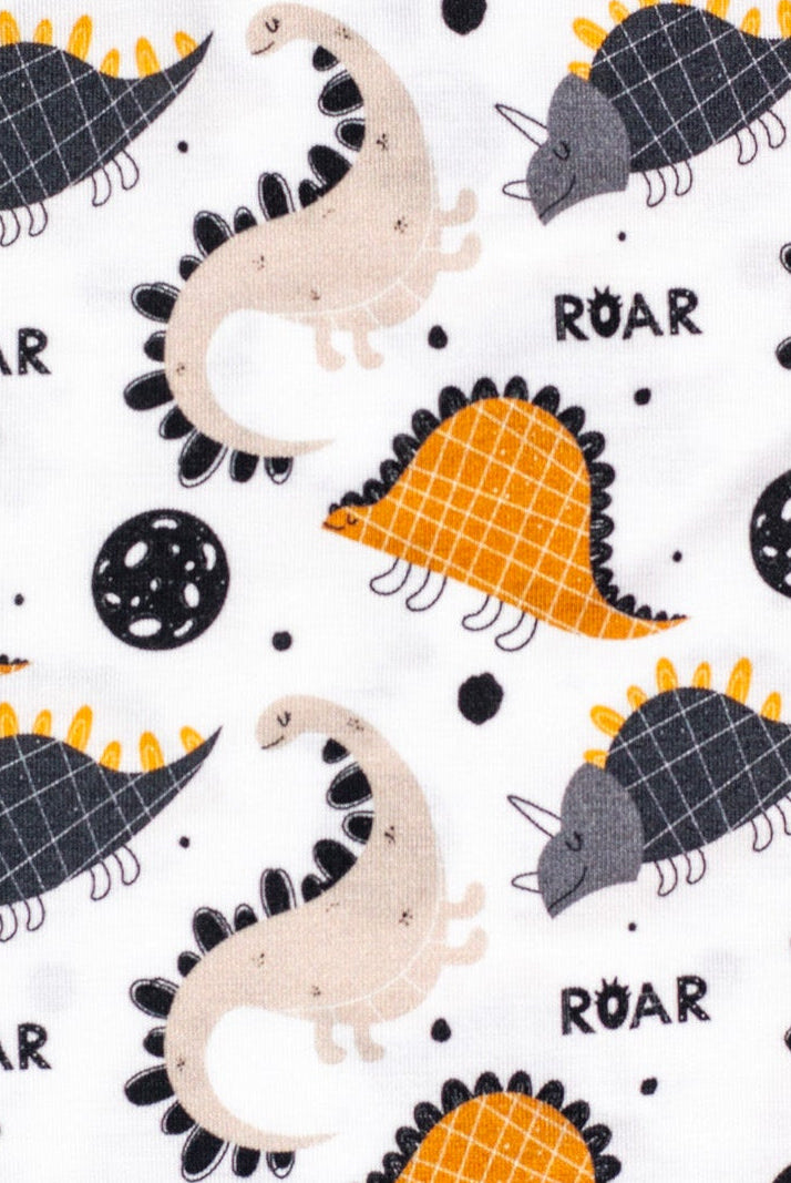 Buttery soft short sleeve pajama set featuring playful dinosaurs for bedtime fun.