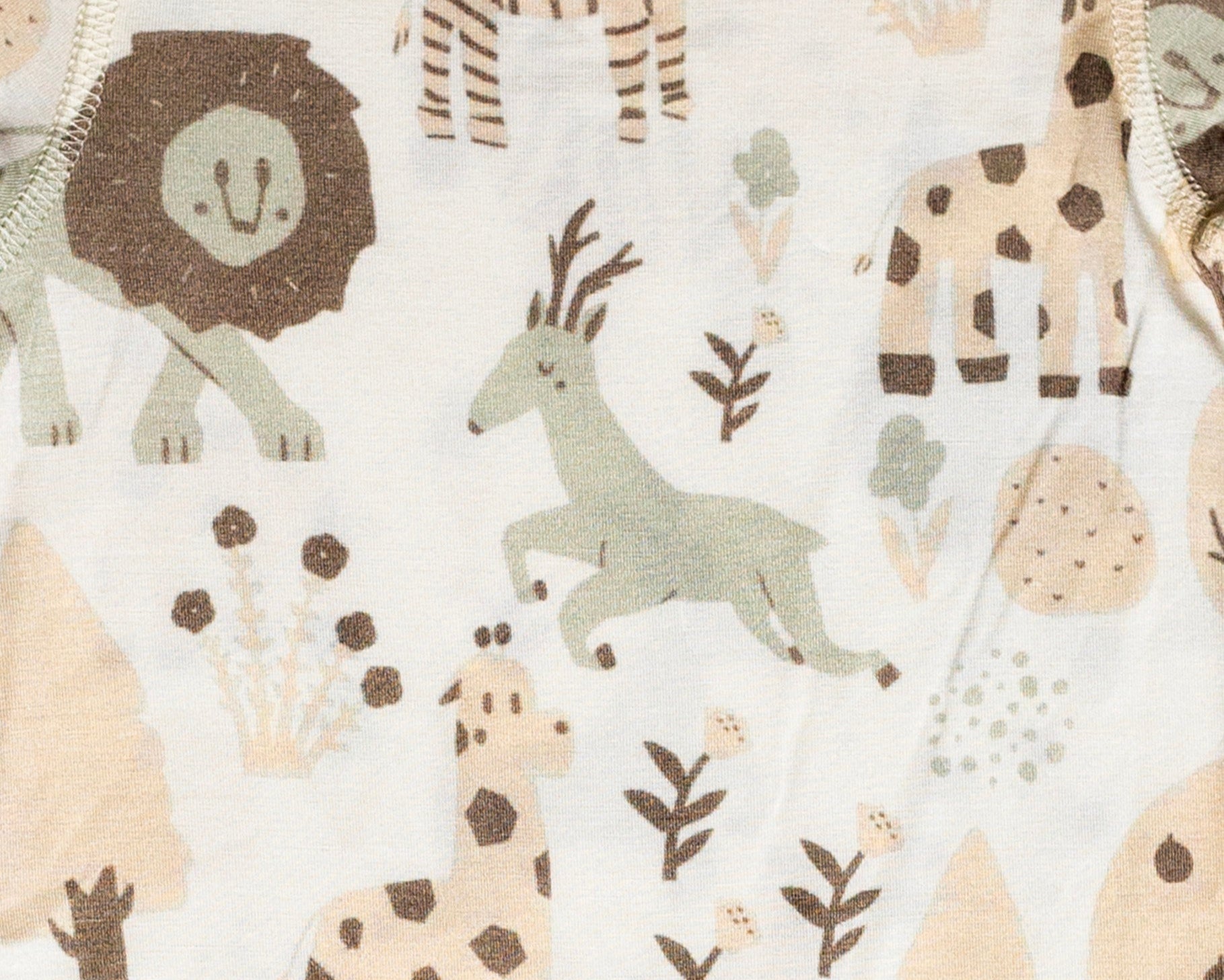 Earthly Threads buttery soft and amazingly gentle bamboo pajama sleeper, featuring zebras, lions, and giraffes for your little one.