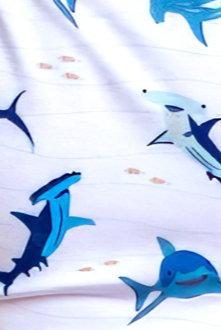 Shark-themed short sleeve or long sleeve pajama set with soft, hypoallergenic bamboo fabric for lightweight, breathable comfort.