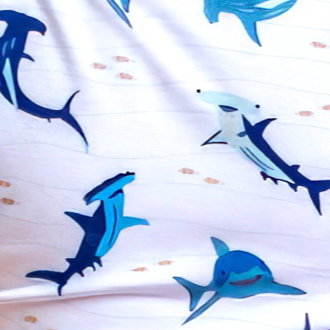 Shark-themed short sleeve or long sleeve pajama set with soft, hypoallergenic bamboo fabric for lightweight, breathable comfort.
