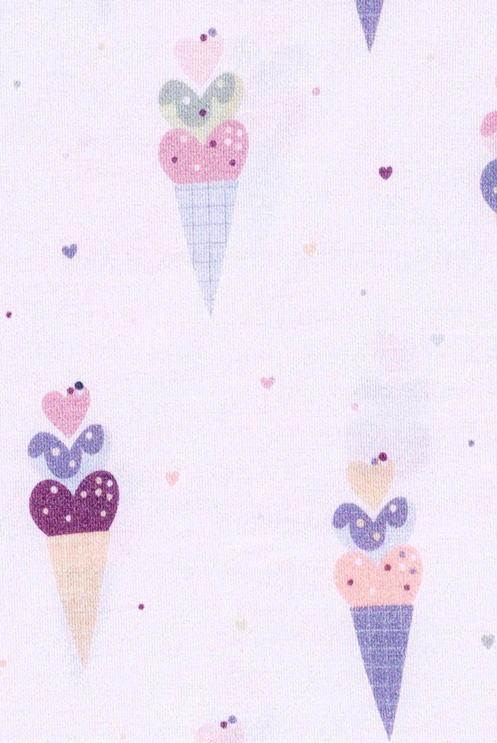 Adorable and breathable bamboo pajamas with a playful ice cream cone pattern, designed for cool, comfortable sleep and gentle on sensitive skin.