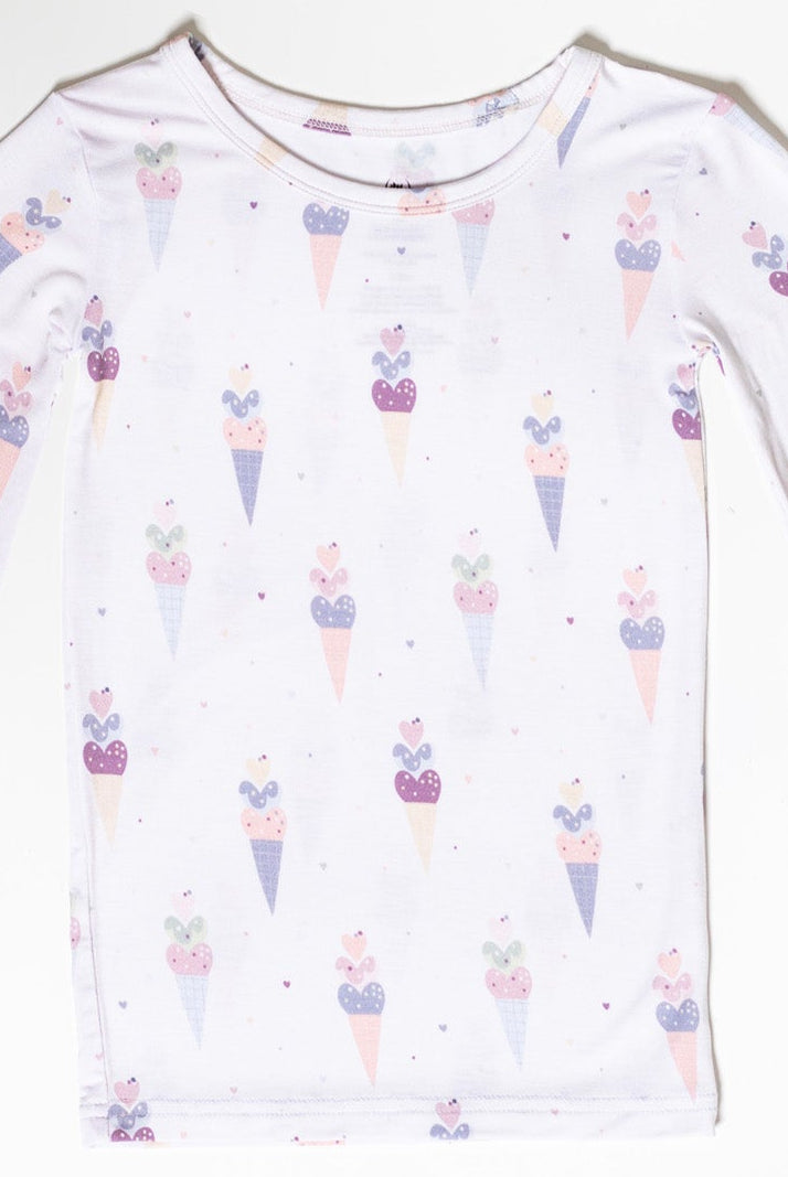 Long sleeve bamboo pajamas for kids featuring a cute ice cream cone print on a pastel background.