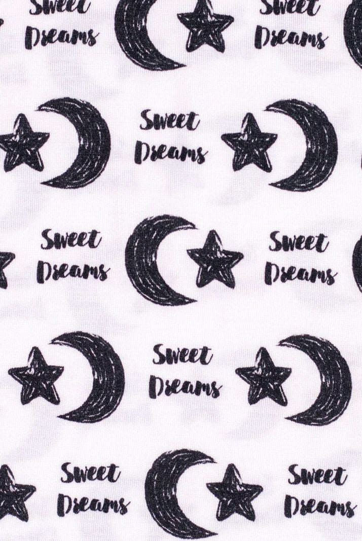 Earthly Threads incredibly soft short sleeve pajama set with moon and stars, alongside the words “Sweet Dreams”.