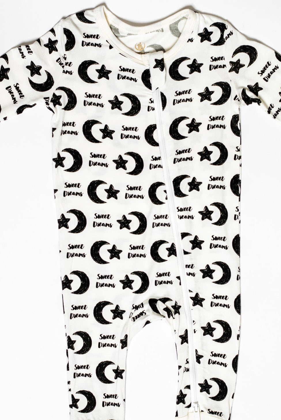 One-piece zip-up sleeper with a peaceful moon and star print, designed for warmth without overheating.