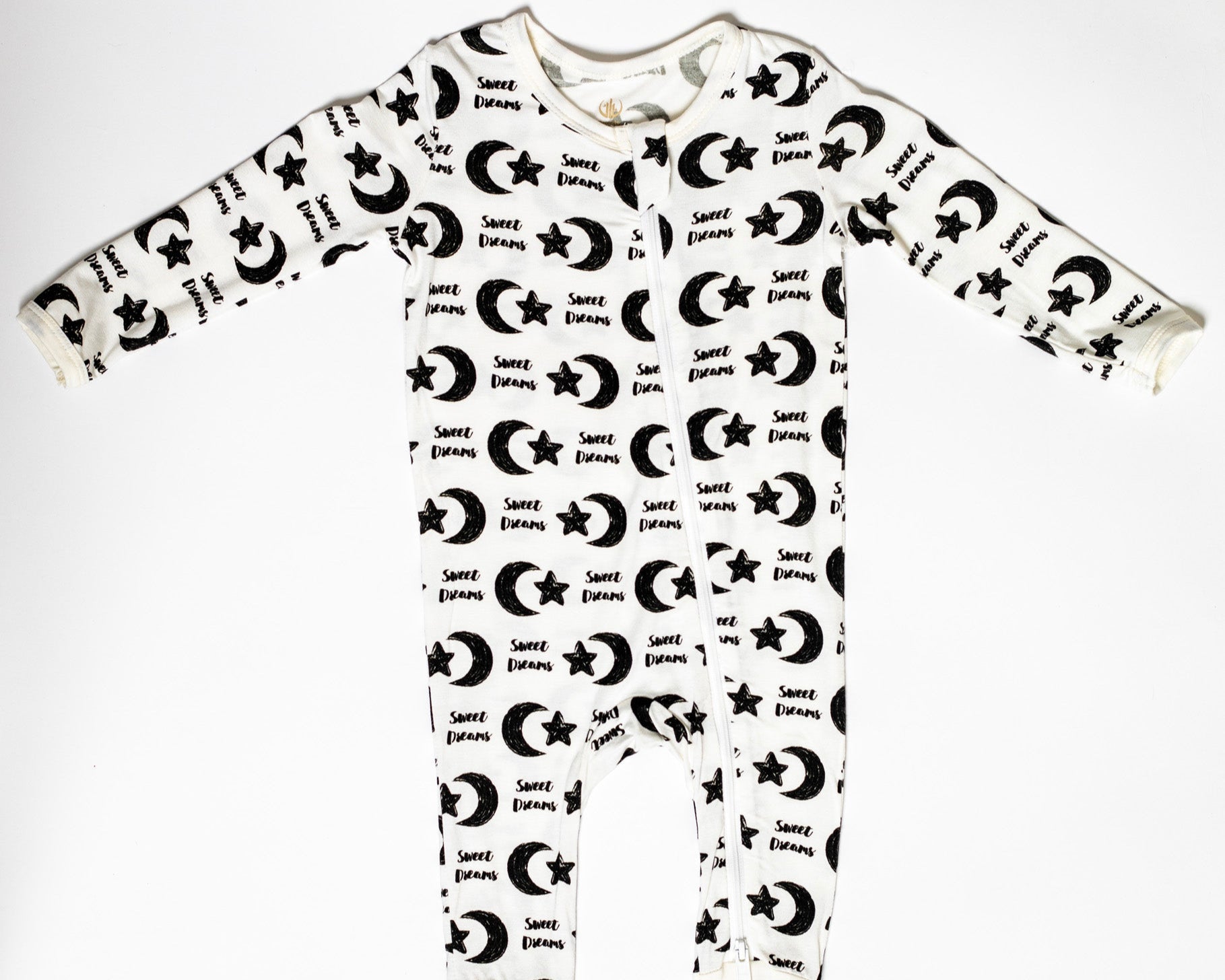 One-piece zip-up sleeper with a peaceful moon and star print, designed for warmth without overheating.