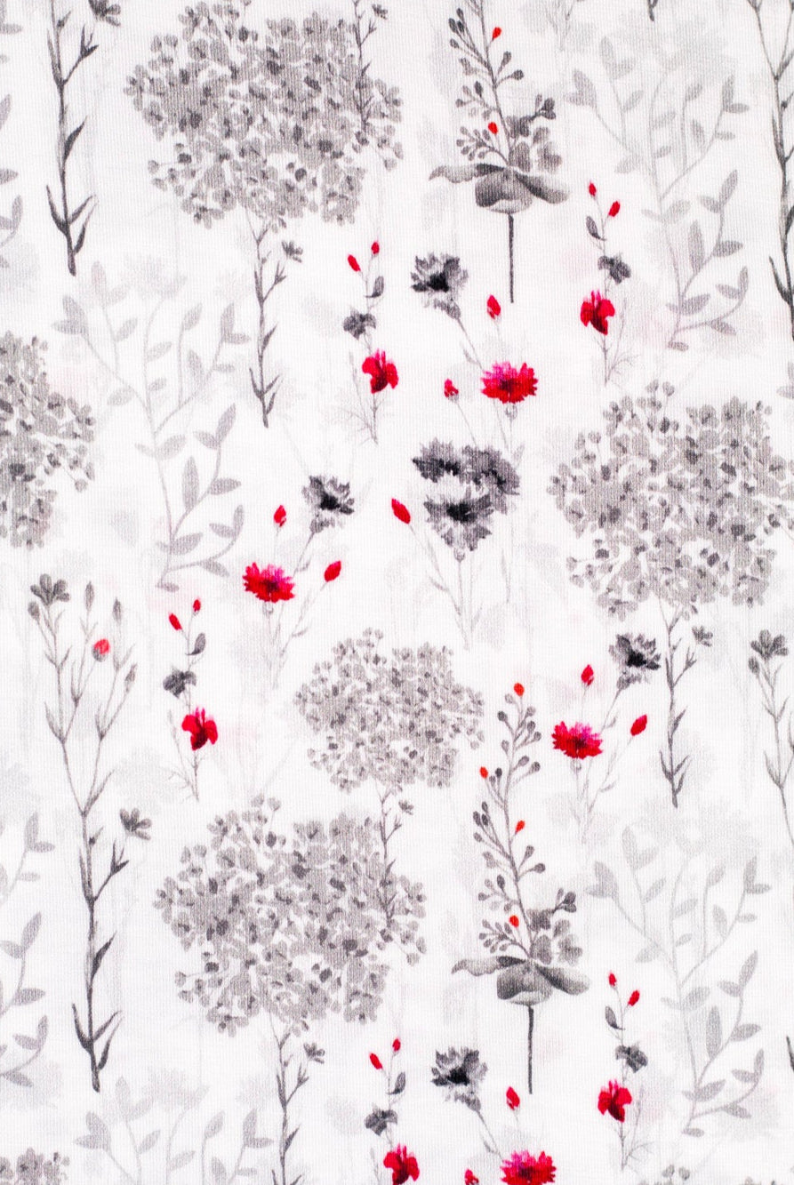 Earthly Threads soft baby sleepwear features an elegant floral print, designed for year-round comfort with moisture-wicking and temperature-regulating properties.
