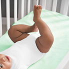 Earthly Threads crib sheets, made from sustainable bamboo provide gentle comfort while protecting against allergens and bacteria.