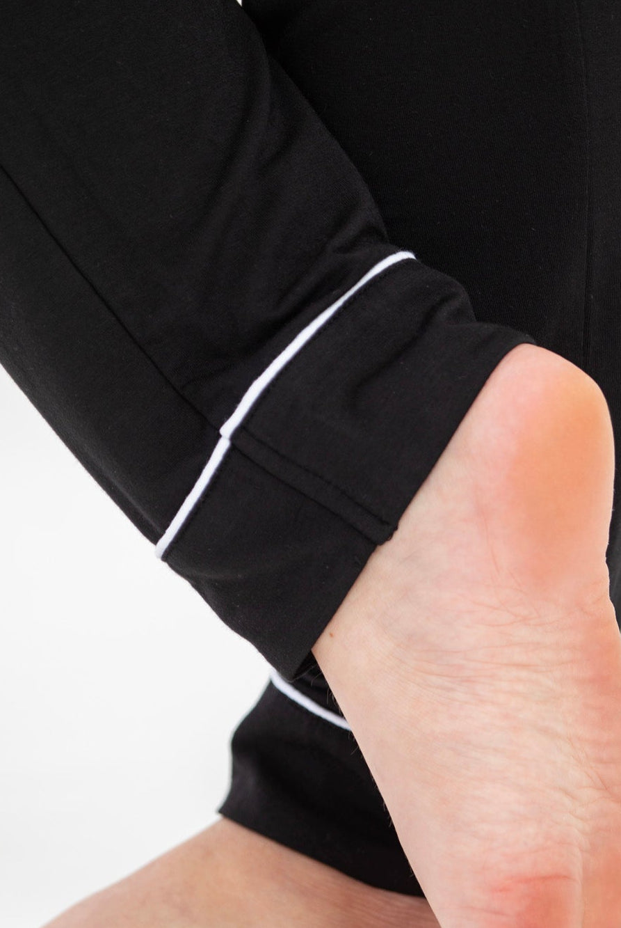 The unwind bamboo classic button down pajama set in black.