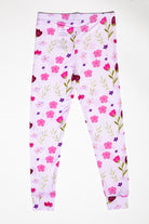 Lightweight and cozy kids floral pajama set, ideal for warm nights and lounging. Available in short sleeves and pants.