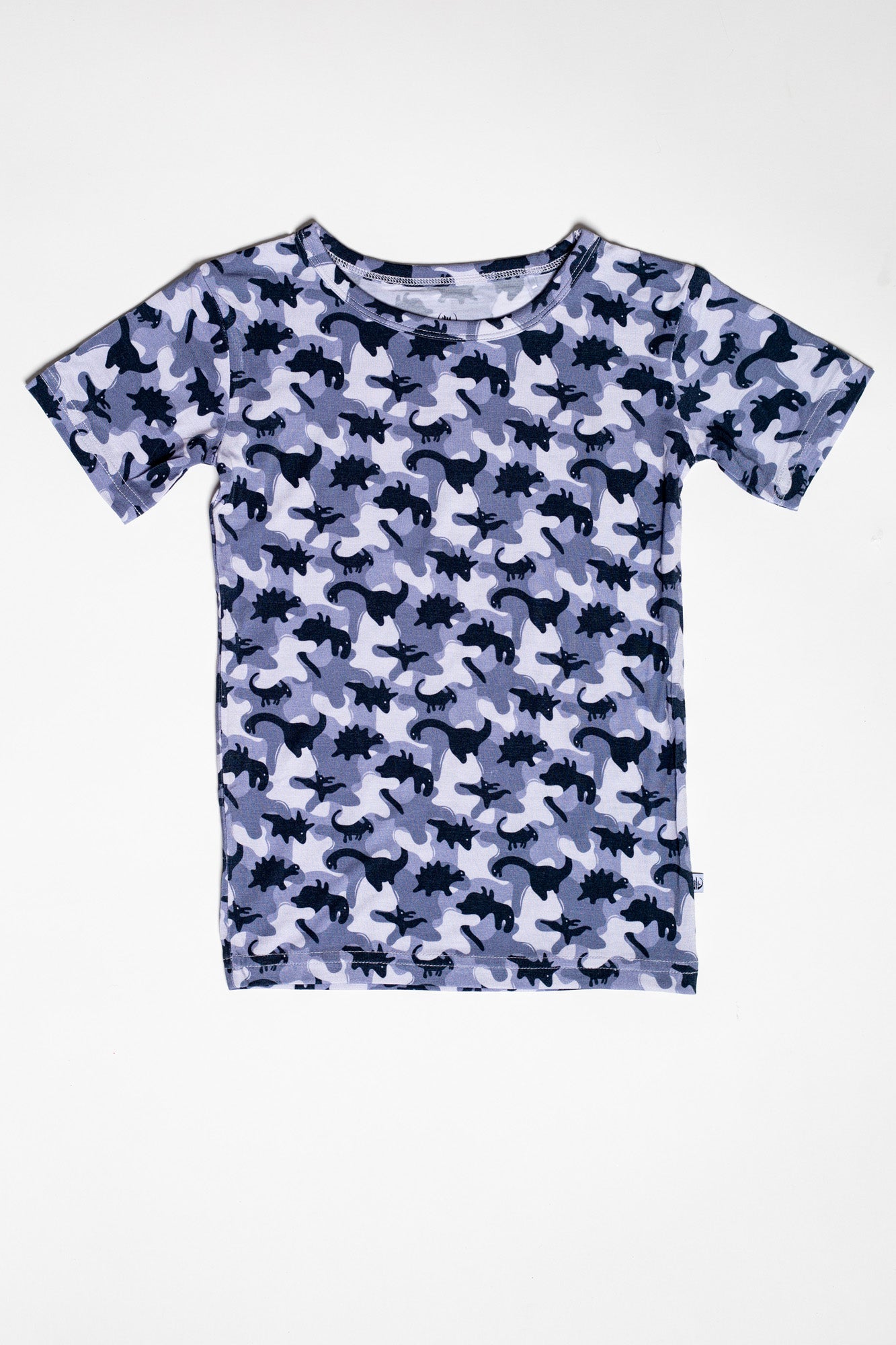 Cozy and hypoallergenic Earthly Threads bamboo short sleeve pajama set for kids designed with a camo-inspired dinosaur print. 