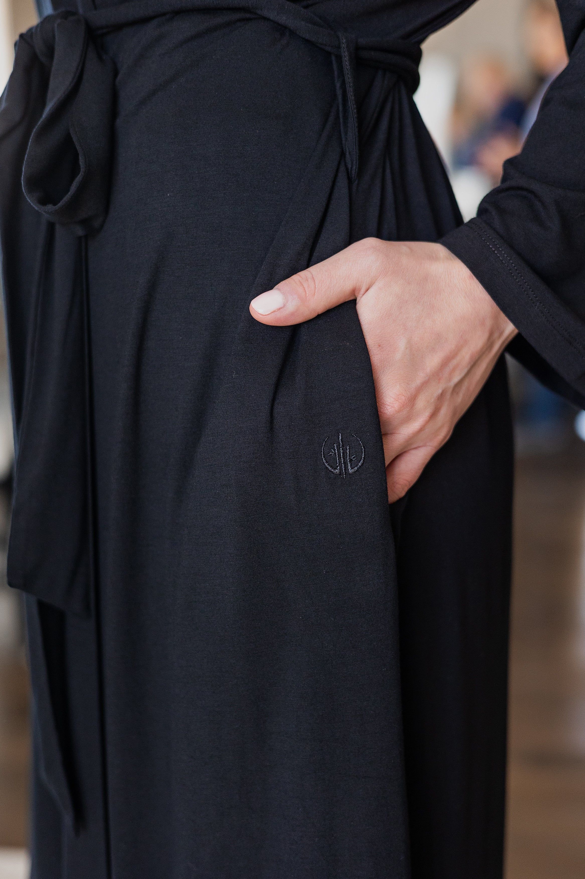 Black chic and cozy bamboo robe with deep side pockets for added convenience.