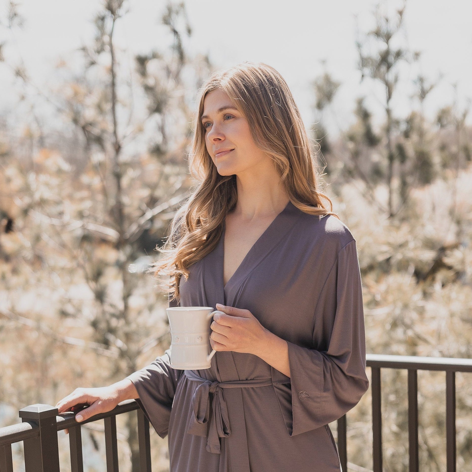 Soft and breathable bamboo long sleeve robe with a relaxed fit and adjustable tie waist for personalized comfort.