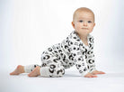 Celestial-themed baby romper, made from eco-friendly bamboo with moisture-wicking and softness for all-night coziness.