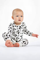 Ultra-soft long sleeve romper crafted from breathable bamboo, featuring a dreamy nighttime design for little ones.