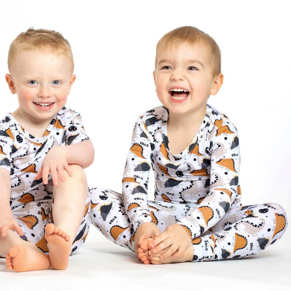 Cozy and breathable bamboo pajamas with a fun dinosaur pattern, designed to keep kids warm, comfy, and stylish at bedtime.