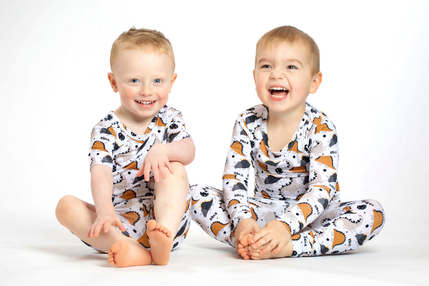 Cozy and breathable bamboo pajamas with a fun dinosaur pattern, designed to keep kids warm, comfy, and stylish at bedtime.