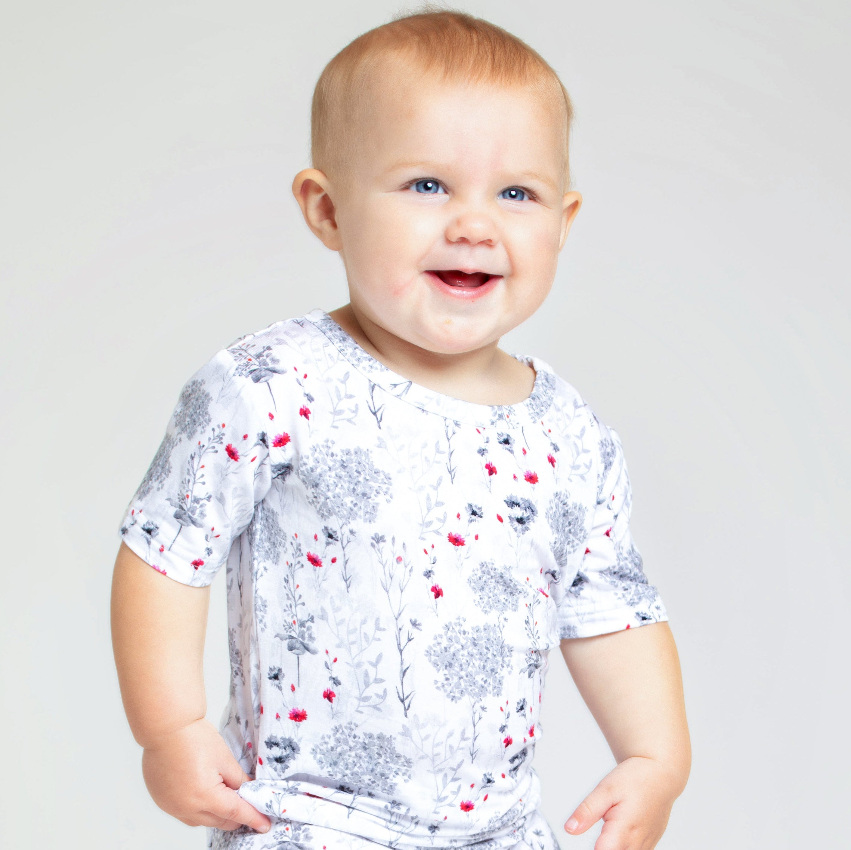 Earthly Threads soft and breathable bamboo baby pajamas featuring delicate floral bouquets for dreamy, irritation-free sleep.