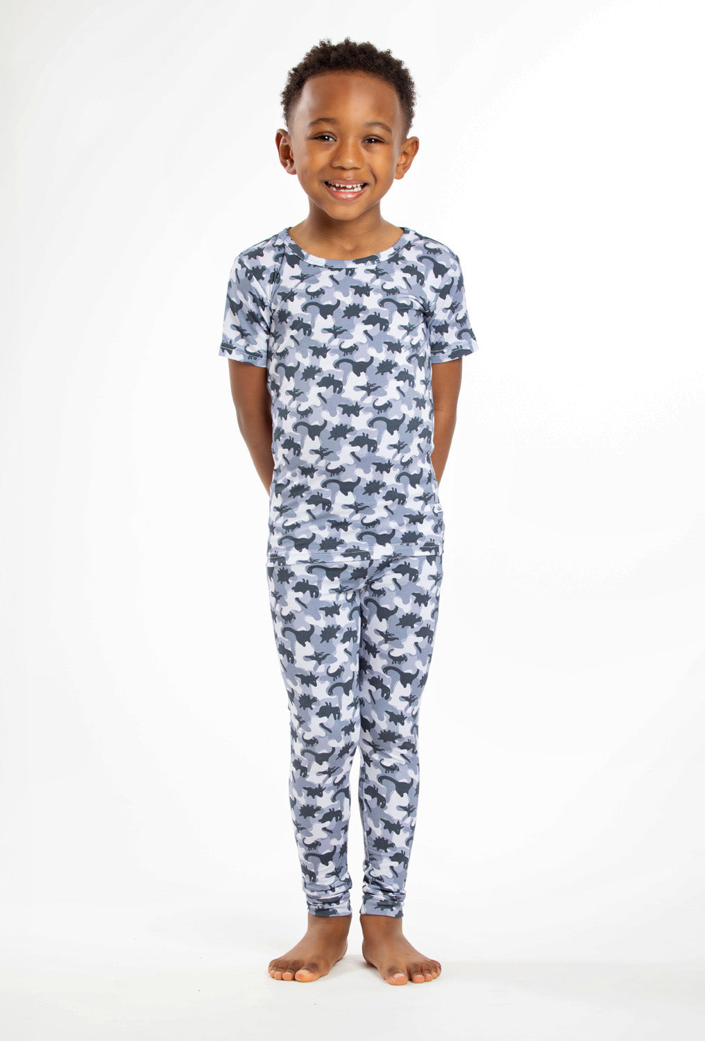 Earthly Threads camo dinosaur bamboo pajamas with a soft, breathable fabric, perfect for sensitive skin.