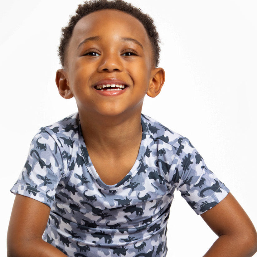 Short sleeve bamboo pajama set for kids with moisture-wicking and temperature-regulating properties.