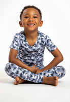 Short sleeve bamboo pajama set for kids with moisture-wicking and temperature-regulating properties.